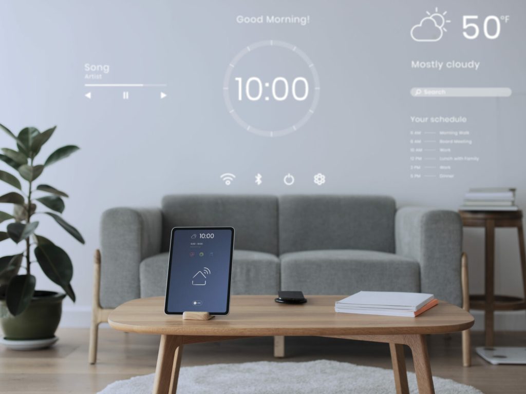 Digital tablet screen with smart home controller on a wooden tab Digital tablet screen with smart home controller on a wooden table